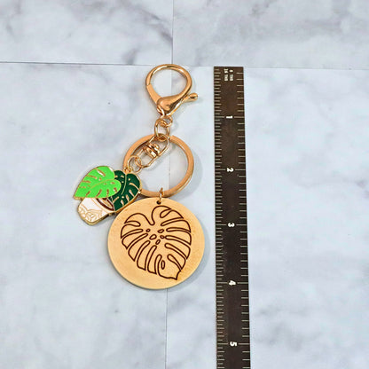 Monstera Keychain: Enamel Plant Charm with Laser Engraved Wood Disc