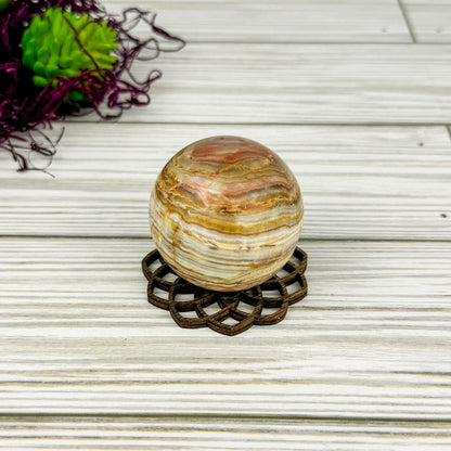 Banded Calcite Sphere - 1.8" Stone Ball with Laser Cut Stand